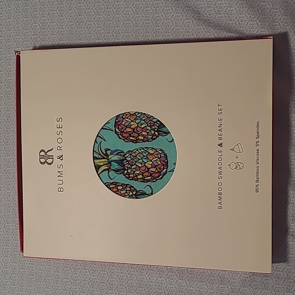 Baby swaddle and beanie set